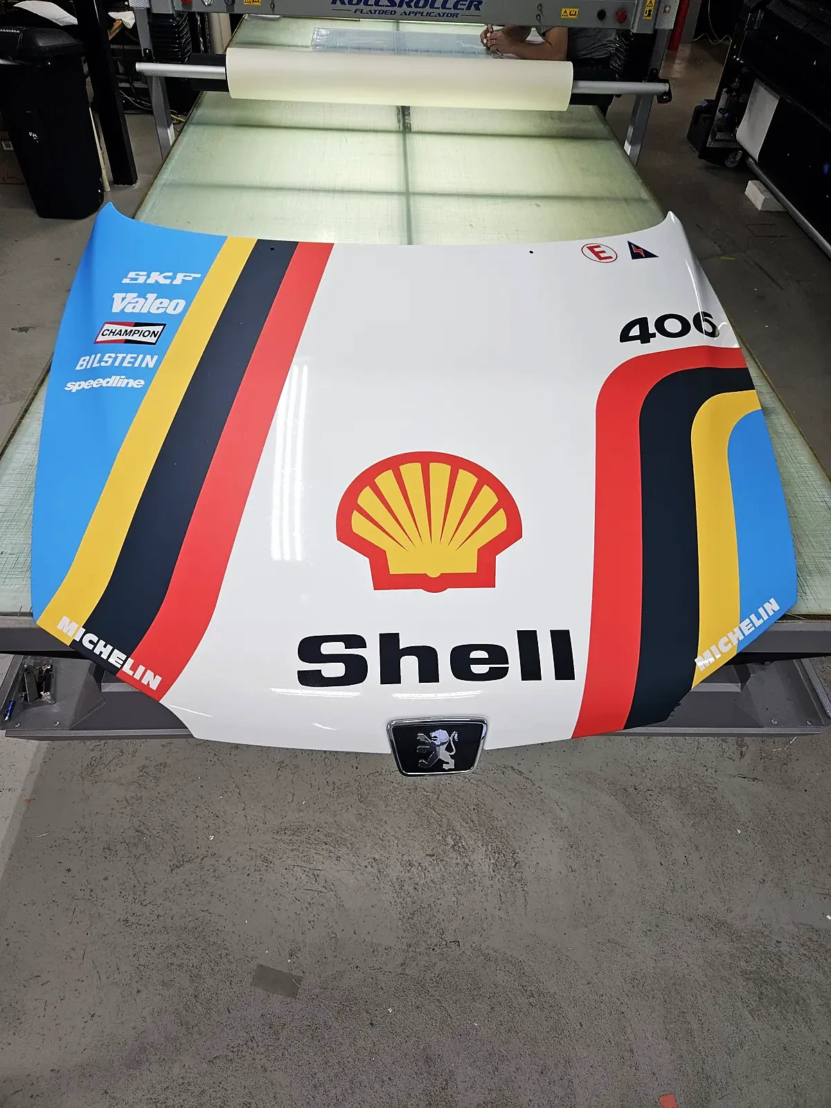Panser på Peugeot med Shell-dekor og startnummer 406