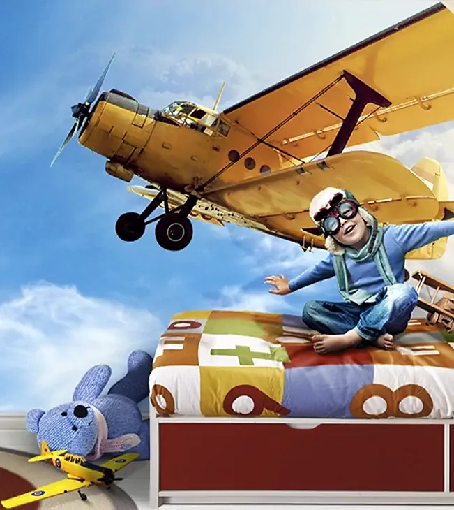 Fototapet med fly og gutt på barnerom
